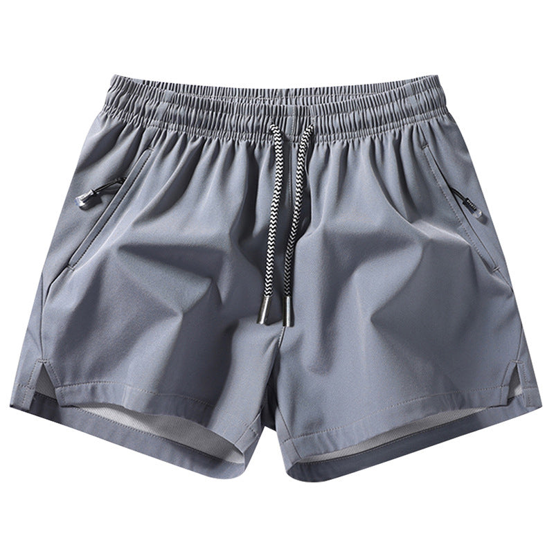 🏆 Meilleure Vente 2026 | Treningsshorts med hurtigtørkende teknologi | Glidelåslommer for nødvendigheter 📱💨【-48%】