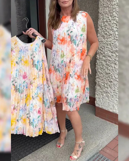 🔥Tidsbegrenset tilbud - Ermeløs midikjole med folder, blomstertrykk og fremhevet midje