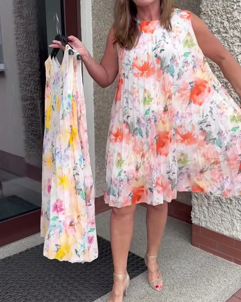 🔥Tidsbegrenset tilbud - Ermeløs midikjole med folder, blomstertrykk og fremhevet midje