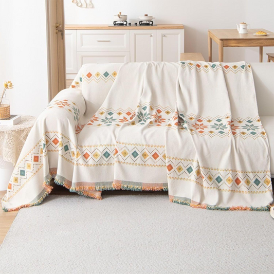 Vendbart bohemsk sofatrekk med dusker