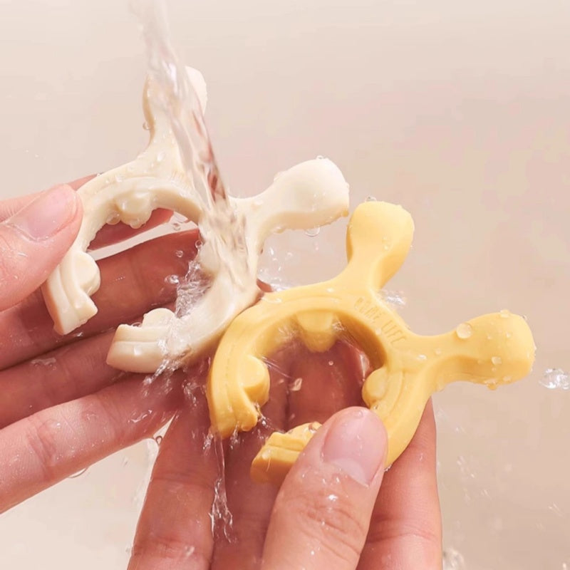 Multifunksjonelt silikonstativ for grytehåndtak og stekespade