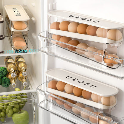🥳2026 VARMT SALG🥳💞50 000+ SOLGT! 🥚🌀 50 % RABATT! Dobbel automatisk rullende eggorganisator – 2-lags oppbevaring i sidedøren, eggene ruller automatisk fremover. Slutt på glemte egg! 🧊✨