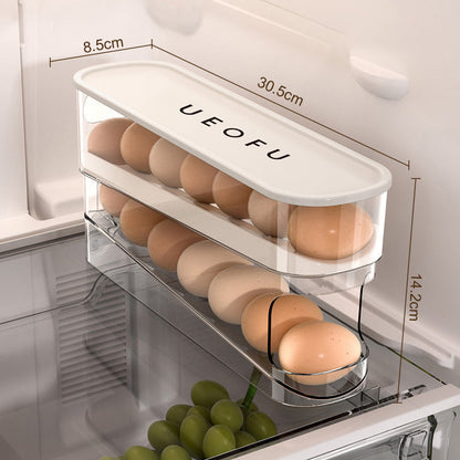 🥳2026 VARMT SALG🥳💞50 000+ SOLGT! 🥚🌀 50 % RABATT! Dobbel automatisk rullende eggorganisator – 2-lags oppbevaring i sidedøren, eggene ruller automatisk fremover. Slutt på glemte egg! 🧊✨