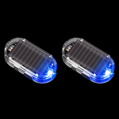 🥳2026 VARMT SALG 🚗🌞 Solcelledrevet billys mot tyveri – solcelledrevet + USB-ladet, blinker automatisk om natten. Realistisk LED-lys etterligner aktiv alarm – avskrekker tyver uten kabling. Varmebestandig, festes og kjøres! 🛡️💡
