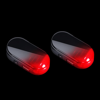 🥳2026 VARMT SALG 🚗🌞 Solcelledrevet billys mot tyveri – solcelledrevet + USB-ladet, blinker automatisk om natten. Realistisk LED-lys etterligner aktiv alarm – avskrekker tyver uten kabling. Varmebestandig, festes og kjøres! 🛡️💡