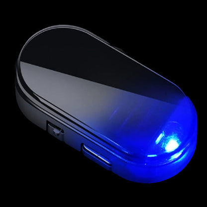 🥳2026 VARMT SALG 🚗🌞 Solcelledrevet billys mot tyveri – solcelledrevet + USB-ladet, blinker automatisk om natten. Realistisk LED-lys etterligner aktiv alarm – avskrekker tyver uten kabling. Varmebestandig, festes og kjøres! 🛡️💡