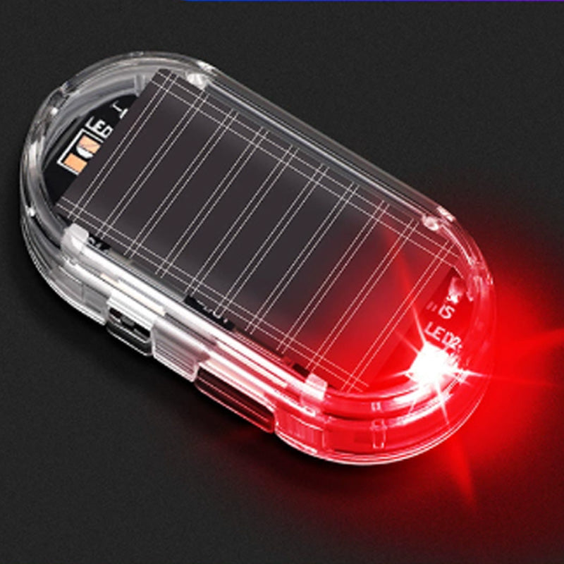 🥳2026 VARMT SALG 🚗🌞 Solcelledrevet billys mot tyveri – solcelledrevet + USB-ladet, blinker automatisk om natten. Realistisk LED-lys etterligner aktiv alarm – avskrekker tyver uten kabling. Varmebestandig, festes og kjøres! 🛡️💡
