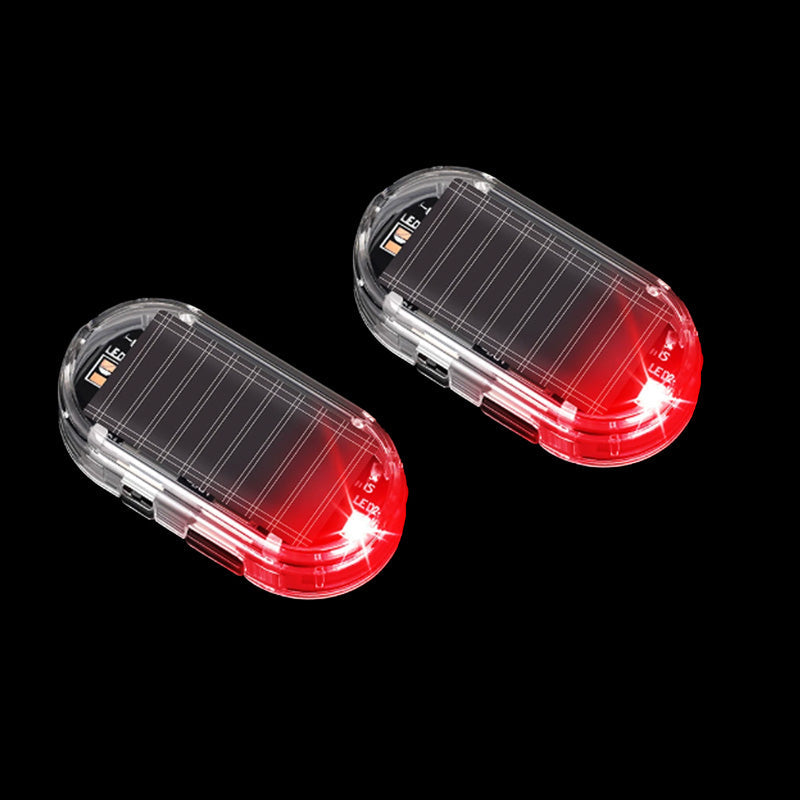 🥳2026 VARMT SALG 🚗🌞 Solcelledrevet billys mot tyveri – solcelledrevet + USB-ladet, blinker automatisk om natten. Realistisk LED-lys etterligner aktiv alarm – avskrekker tyver uten kabling. Varmebestandig, festes og kjøres! 🛡️💡