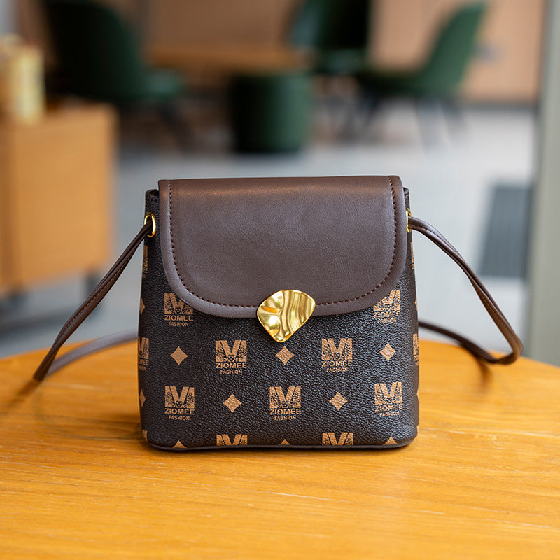 Crossbody-veske med monogrammønster for kvinner