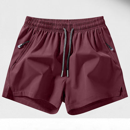 🏆 Meilleure Vente 2026 | Treningsshorts med hurtigtørkende teknologi | Glidelåslommer for nødvendigheter 📱💨【-48%】