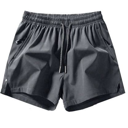 🏆 Meilleure Vente 2026 | Treningsshorts med hurtigtørkende teknologi | Glidelåslommer for nødvendigheter 📱💨【-48%】