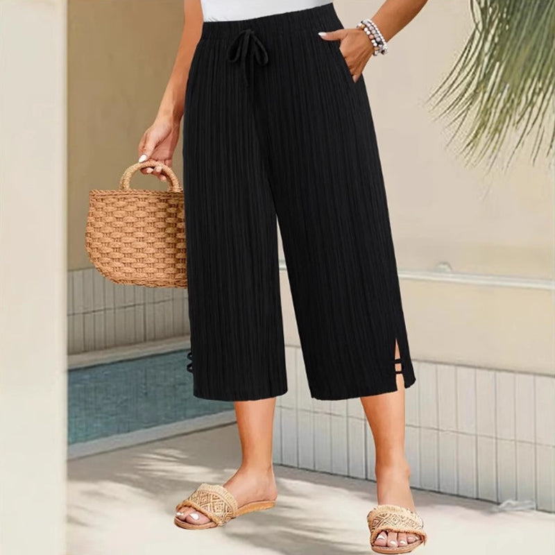 ⏳Tidsbegrenset spesialtilbud⏰Ribbede vide capribukser – Elastisk snøring i midjen, sidelommer og splitt nederst (Armygrønn/Marineblå/Svart | 1XL–5XL) 👖🌿