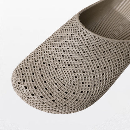 Unisex pustende slip-in tøfler med nettinghull