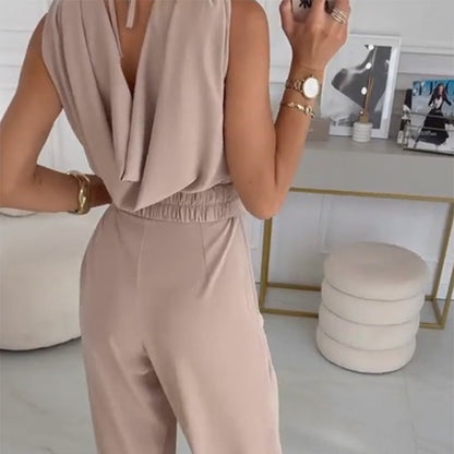 Ermeløs jumpsuit med blomsterdekorasjon til dame