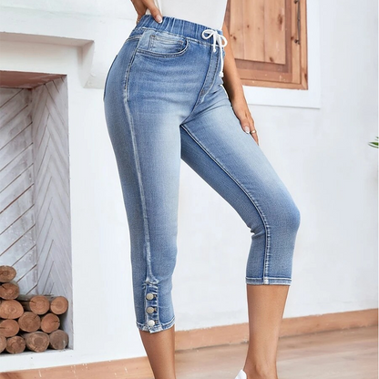 Stretchiga caprijeans för damer med dragsko i midja