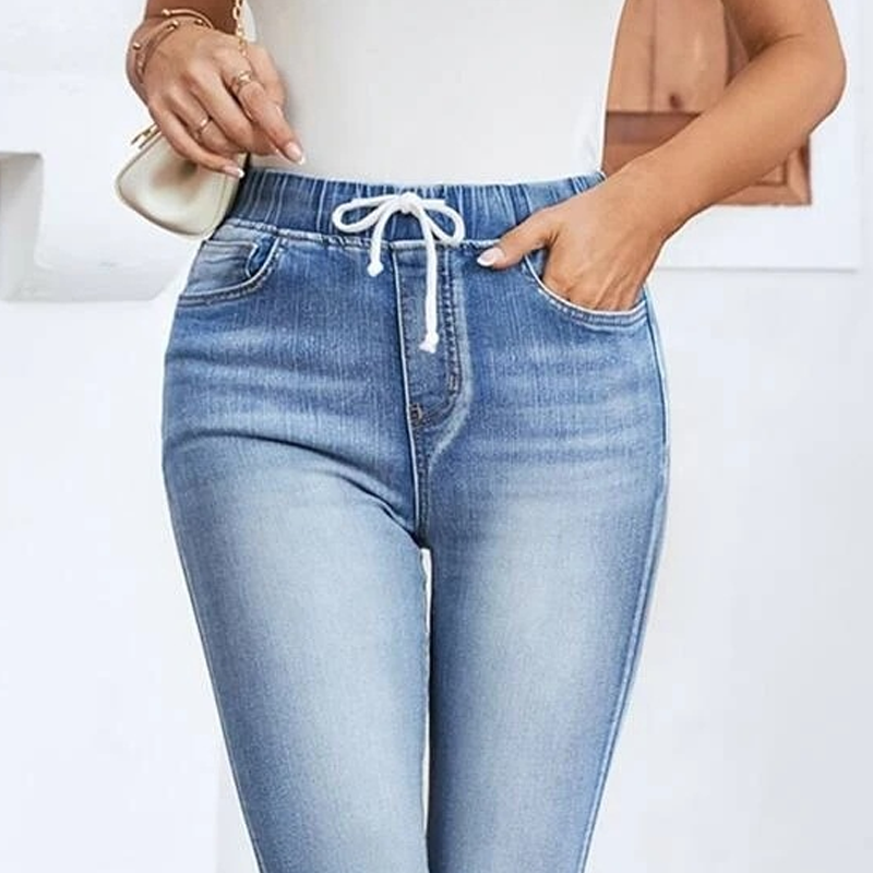 Stretchiga caprijeans för damer med dragsko i midja