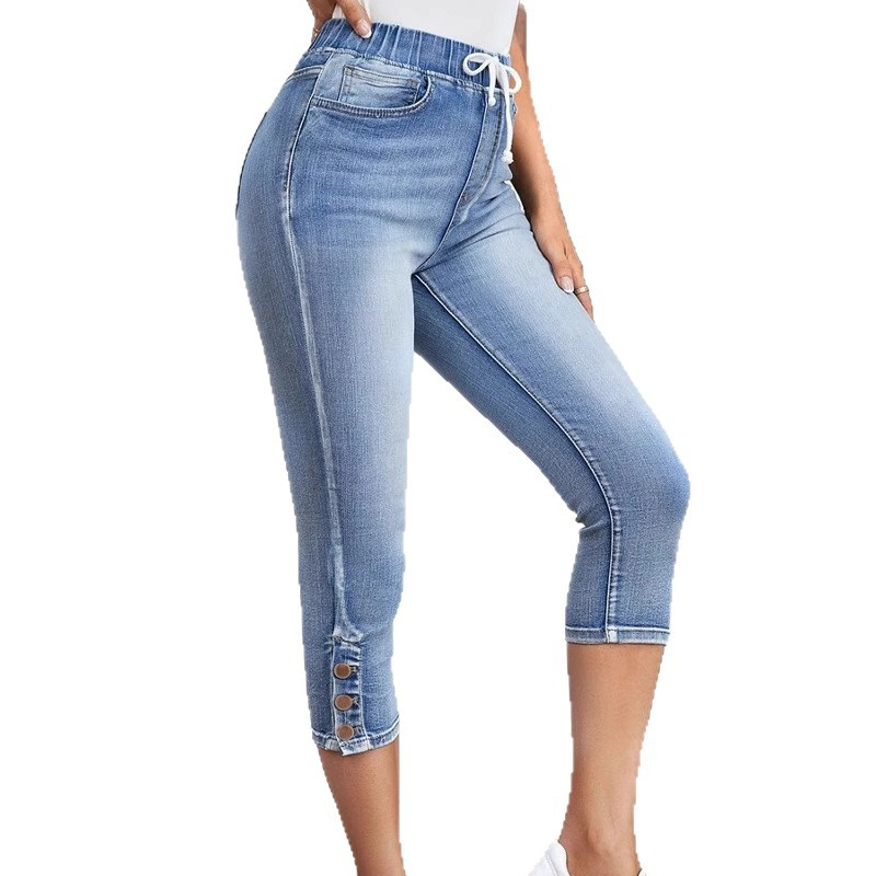 Stretchiga caprijeans för damer med dragsko i midja