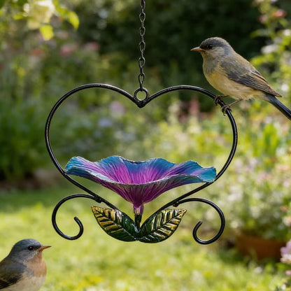 Hjerteformet fuglemater med blomsterdesign