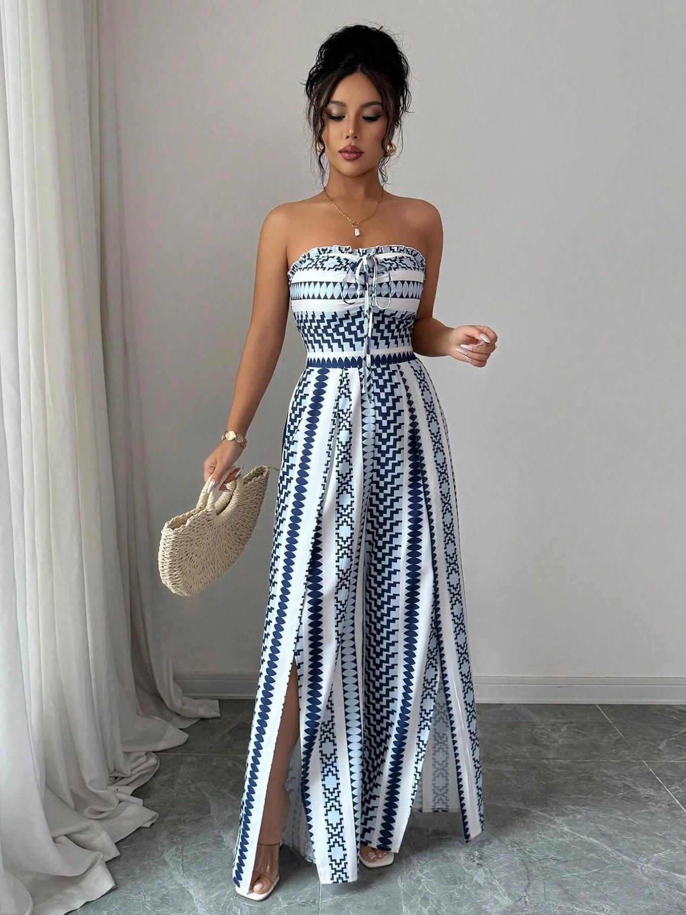 👗💙 Geometrisk jumpsuit med halterneck og sidesliss!