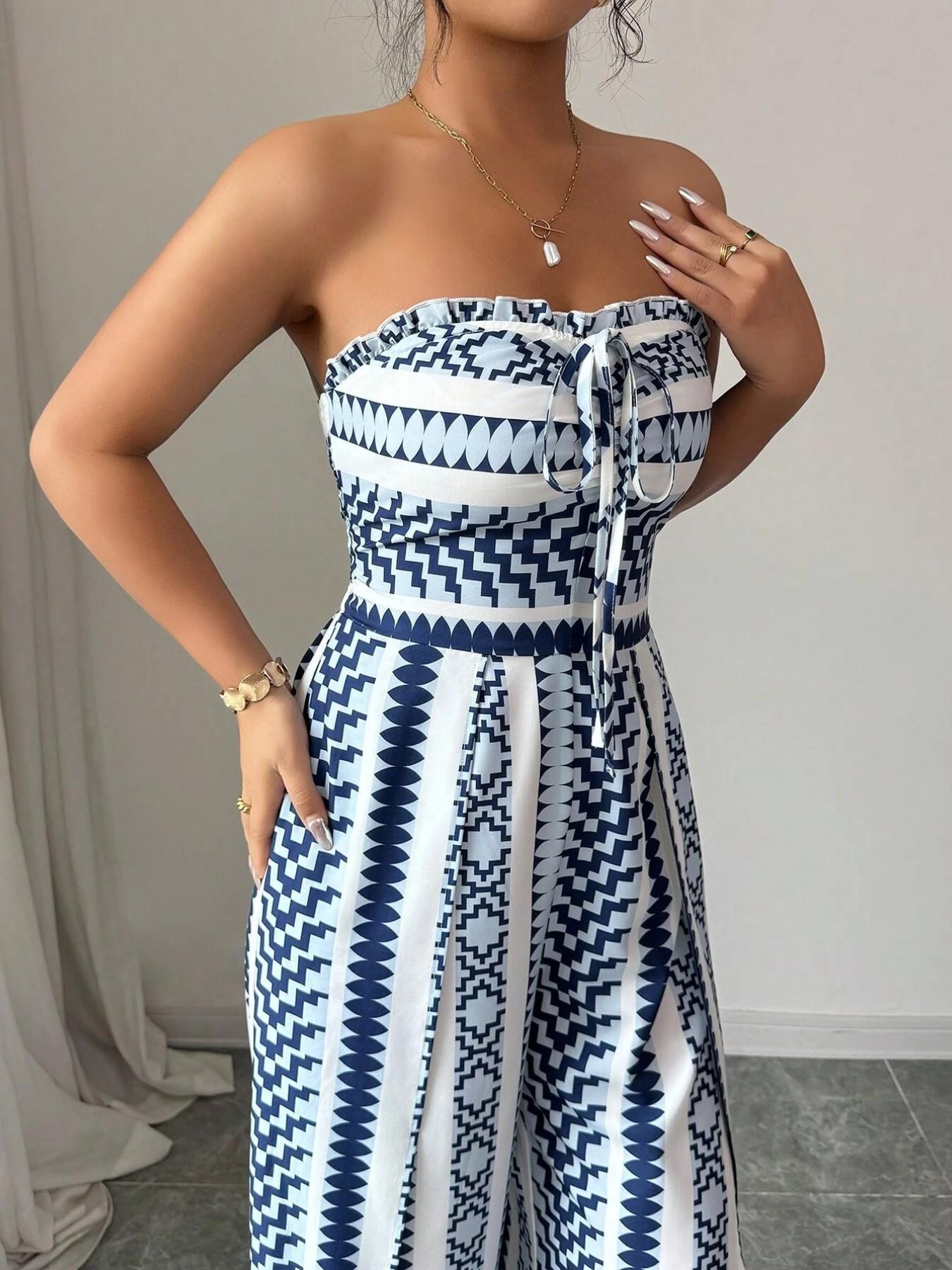 👗💙 Geometrisk jumpsuit med halterneck og sidesliss!